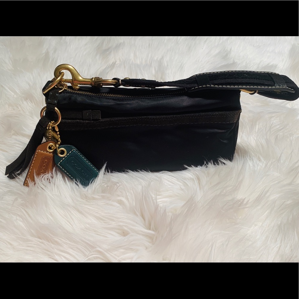 Coach wrislet/tote/clutch